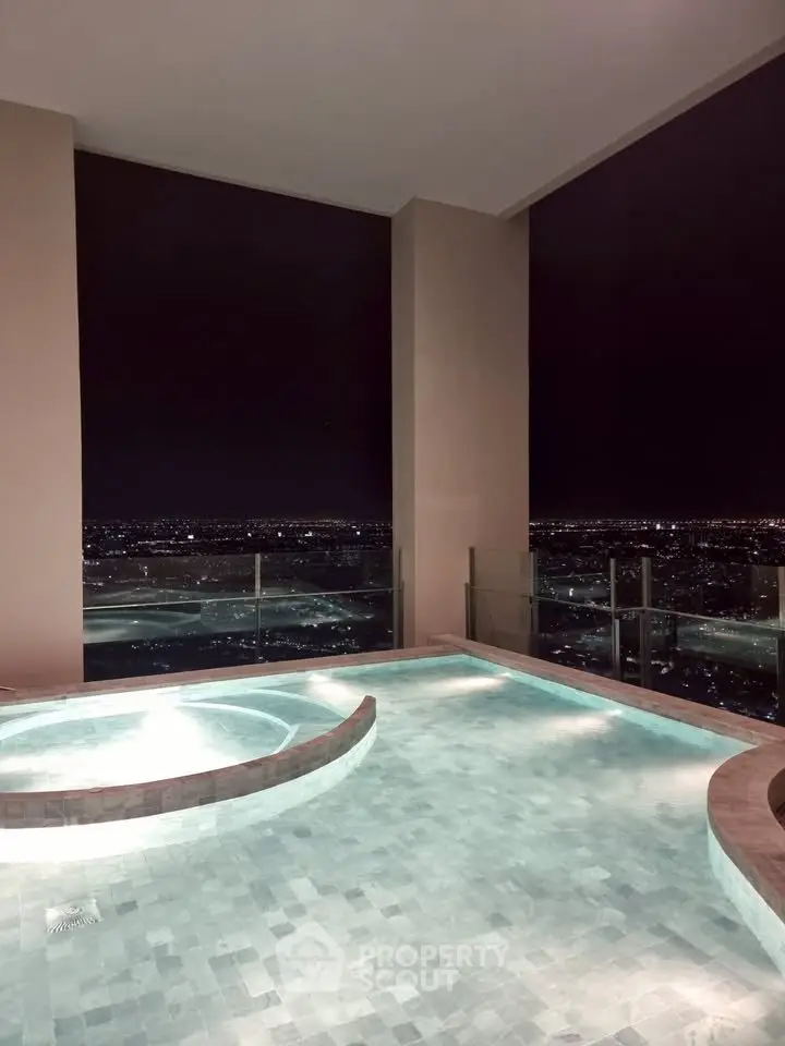 Luxurious rooftop pool with stunning city night view