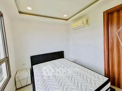 Modern bedroom with sleek design and natural light