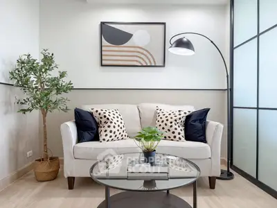 Stylish living room with modern decor, cozy sofa, and elegant lighting for a chic urban lifestyle.