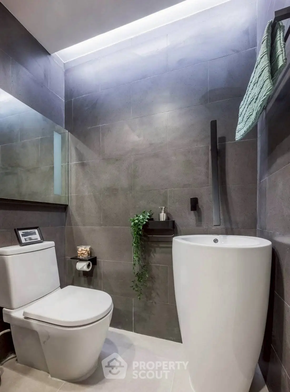 Modern bathroom with sleek fixtures and ambient lighting