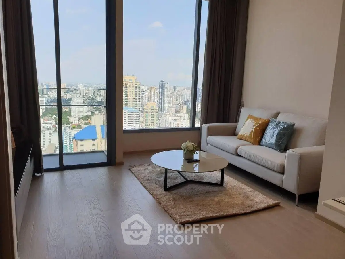 Stunning living room with panoramic city view and elegant decor