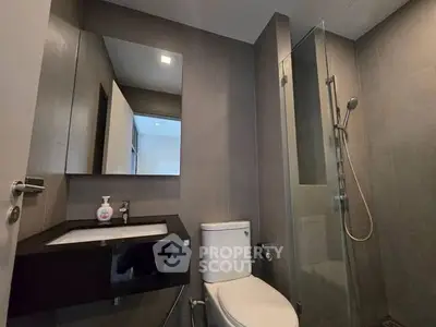Modern bathroom with sleek design and glass shower enclosure
