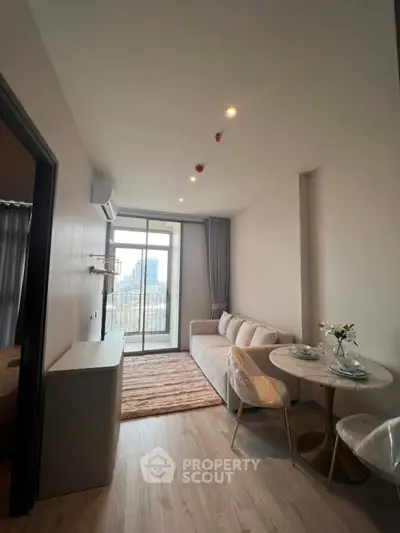 Modern living room with balcony view in a stylish apartment