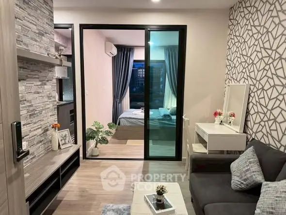 Modern apartment interior with stylish living room and cozy bedroom view.