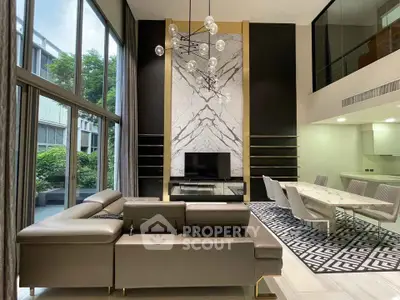 Luxurious modern living room with high ceilings and elegant decor