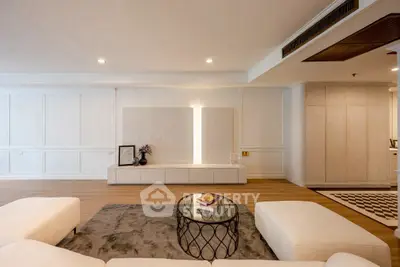 Spacious modern living room with elegant decor and cozy seating area