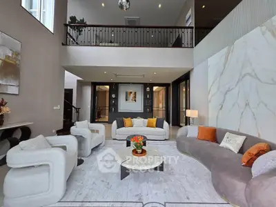 Luxurious modern living room with high ceilings and elegant decor