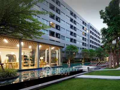 Modern apartment building with pool and lush garden, perfect for luxury living.