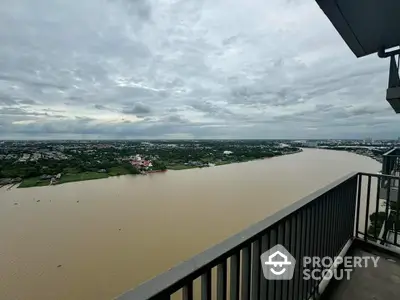 Stunning river view from high-rise balcony with expansive skyline