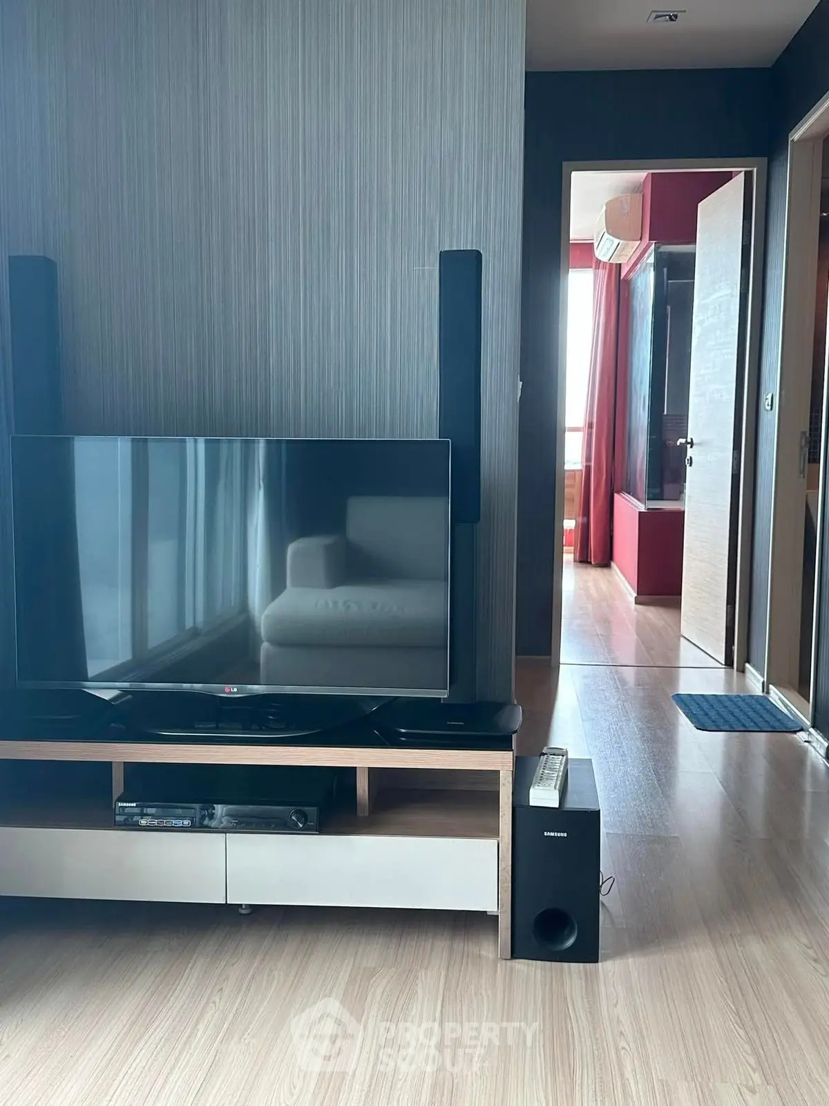 Modern living room with sleek TV setup and stylish decor