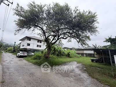 Charming rural property with lush greenery and spacious surroundings, perfect for serene living.