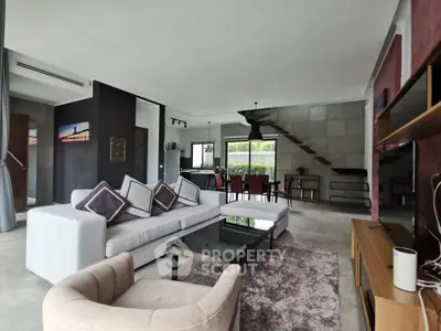 Spacious modern living room with open layout and stylish decor