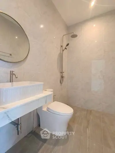Modern bathroom with sleek fixtures and elegant tile design