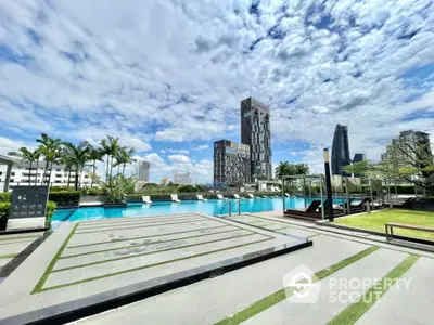 Luxurious rooftop pool with stunning city skyline views and modern architecture.