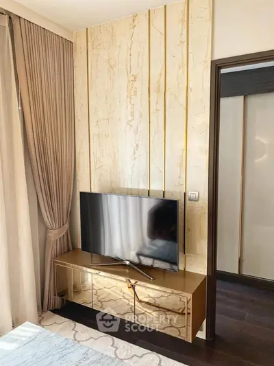 Luxurious living room with elegant TV setup and stylish decor