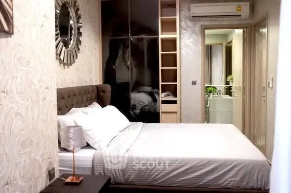 Cozy bedroom with modern decor and built-in storage