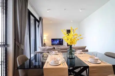 Modern living room with elegant dining area and stylish decor