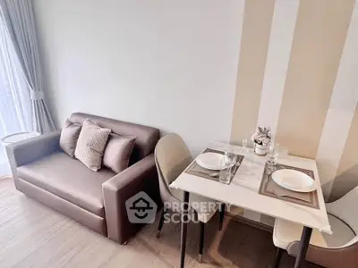 Modern living room with cozy sofa and dining area in stylish apartment