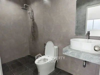 Modern bathroom with sleek fixtures and elegant tile design