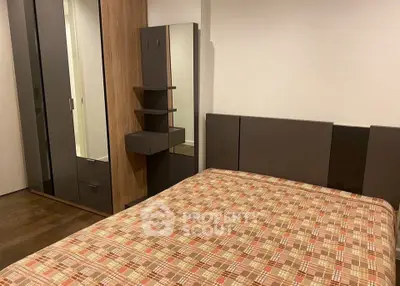 Modern bedroom with stylish furniture and cozy ambiance, perfect for relaxation and comfort.