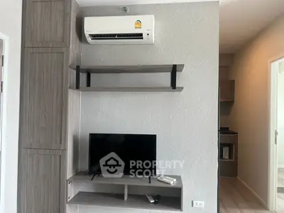 Modern apartment interior with air conditioning and TV setup