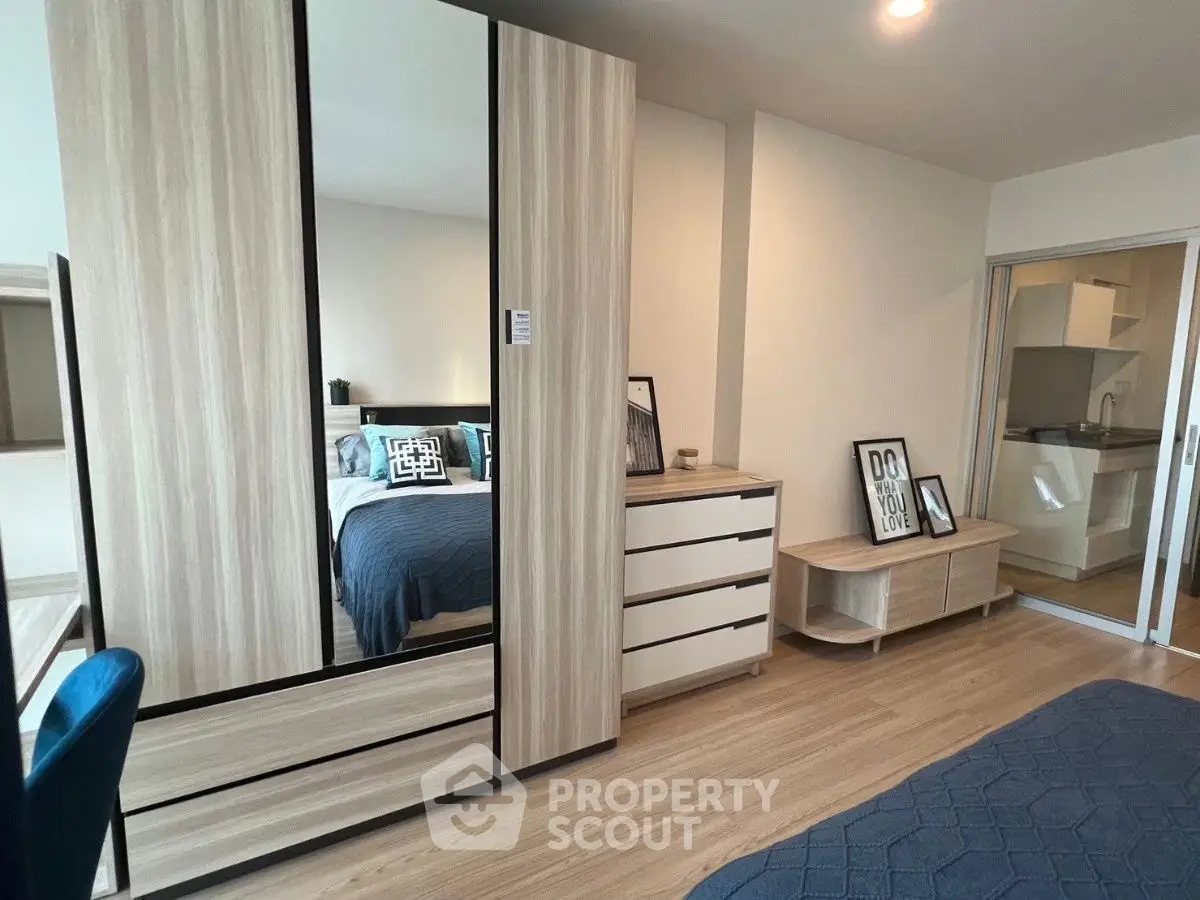 Modern bedroom with stylish wooden furniture and cozy decor