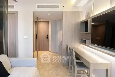 Modern living room with sleek furniture and built-in shelving, ideal for contemporary urban living.