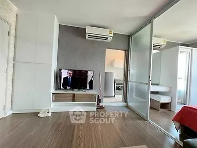 Modern living room with sleek design and air conditioning