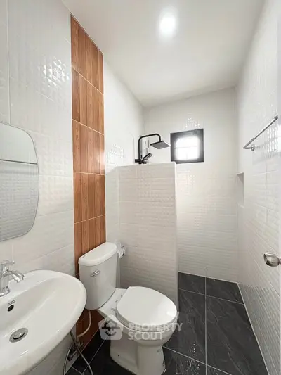 Modern bathroom with sleek fixtures and stylish tile design