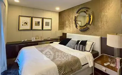 Luxurious bedroom with modern decor and elegant lighting, perfect for relaxation and comfort.