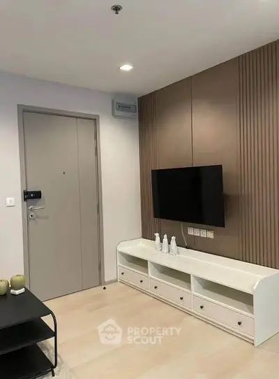 Modern living room with sleek TV setup and stylish decor