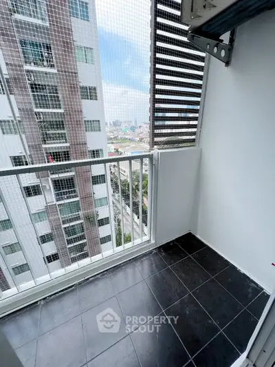 Modern balcony with city view in high-rise apartment