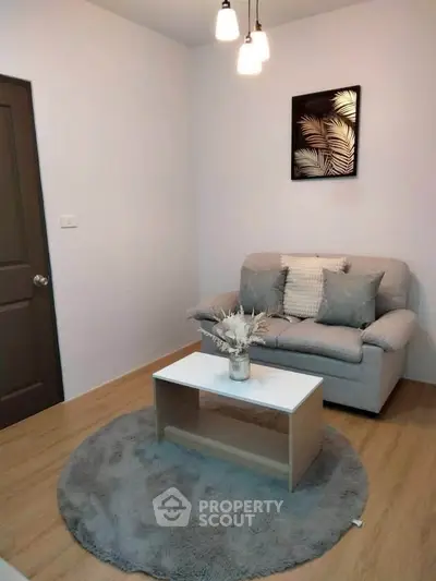 Cozy living room with modern decor and comfortable seating