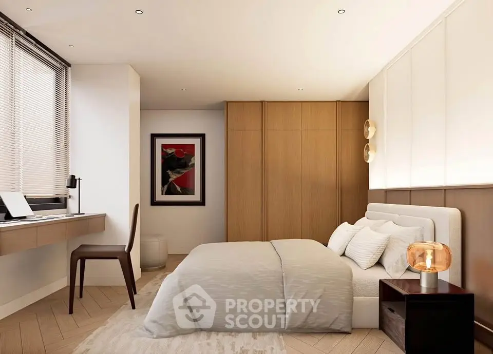 Modern bedroom with stylish decor and workspace, featuring elegant lighting and wooden accents.