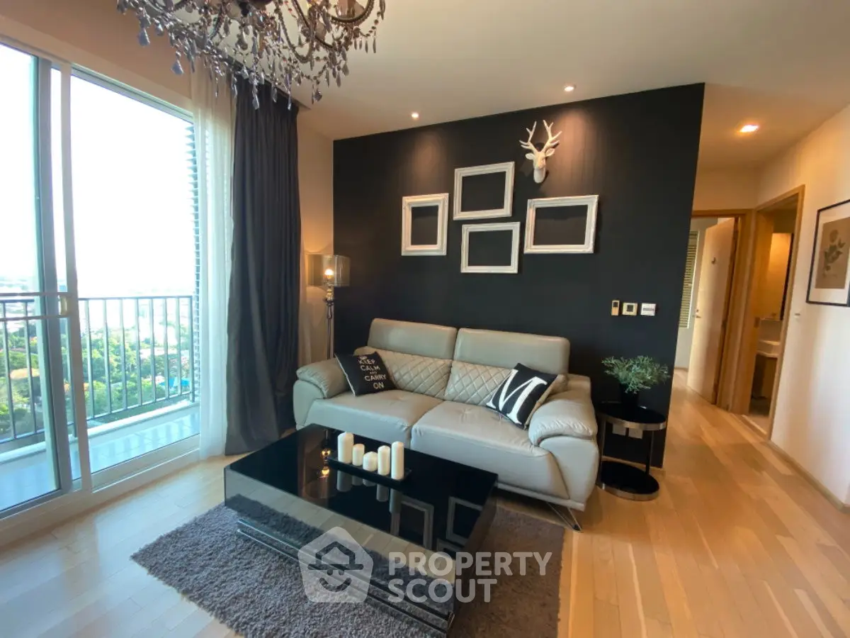 Stylish modern living room with balcony view and elegant decor