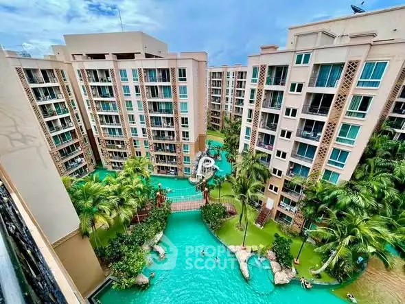 Luxurious resort-style condominium with stunning pool and lush greenery
