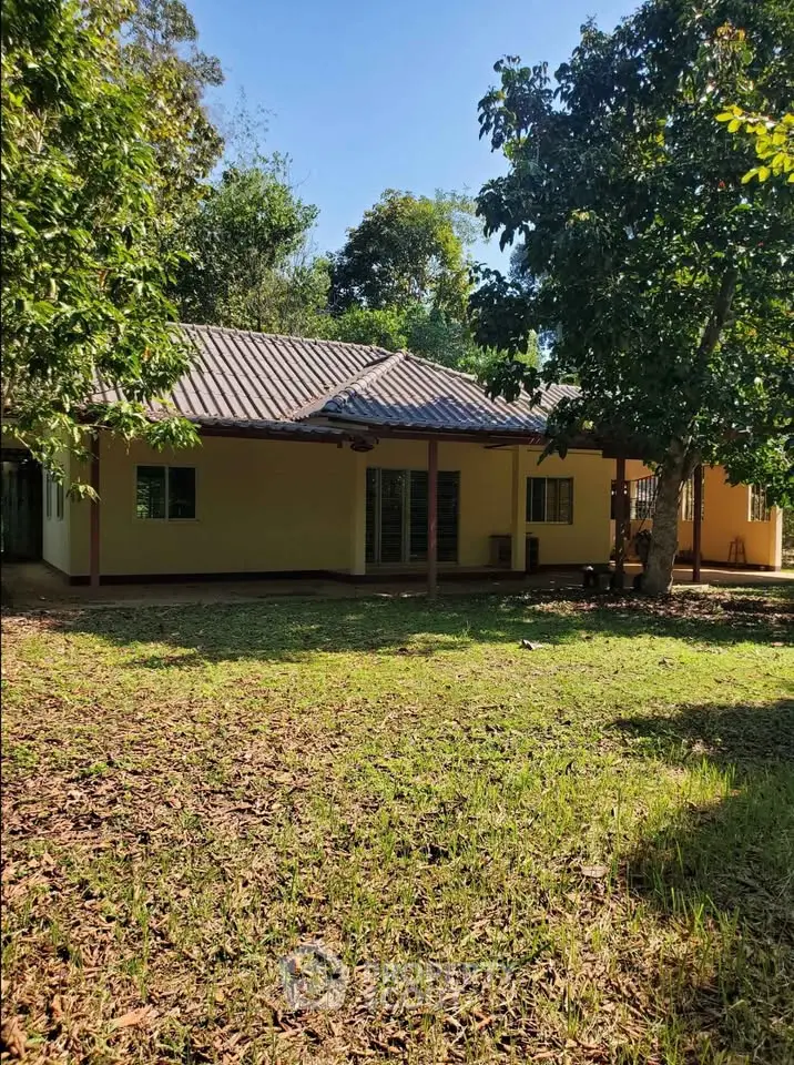 Charming single-story home with lush garden and serene surroundings, perfect for nature lovers seeking tranquility.