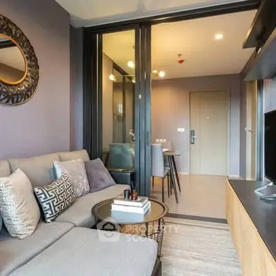 Modern living room with stylish decor and open layout in a contemporary apartment.