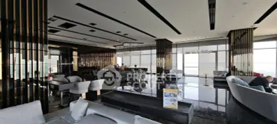 Luxurious modern lounge with panoramic city views and elegant seating areas.