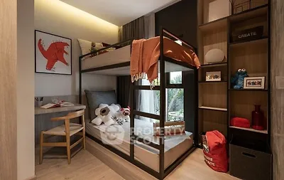 Charming kids' bedroom with bunk beds and playful decor, perfect for family living.