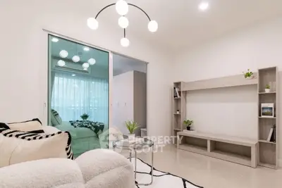 Modern living room with stylish lighting and cozy seating area