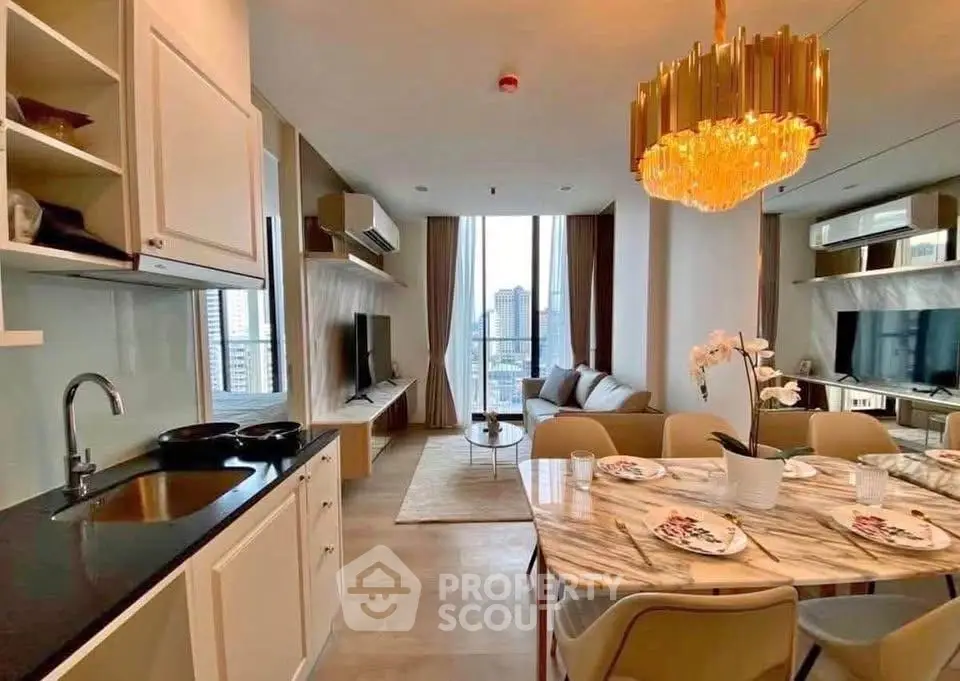 Luxurious modern living room with open kitchen and stunning city view