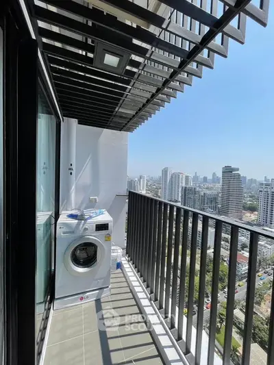 Modern high-rise balcony with washing machine and stunning city view