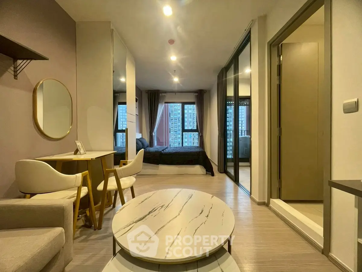 Modern apartment interior with stylish living area and bedroom view