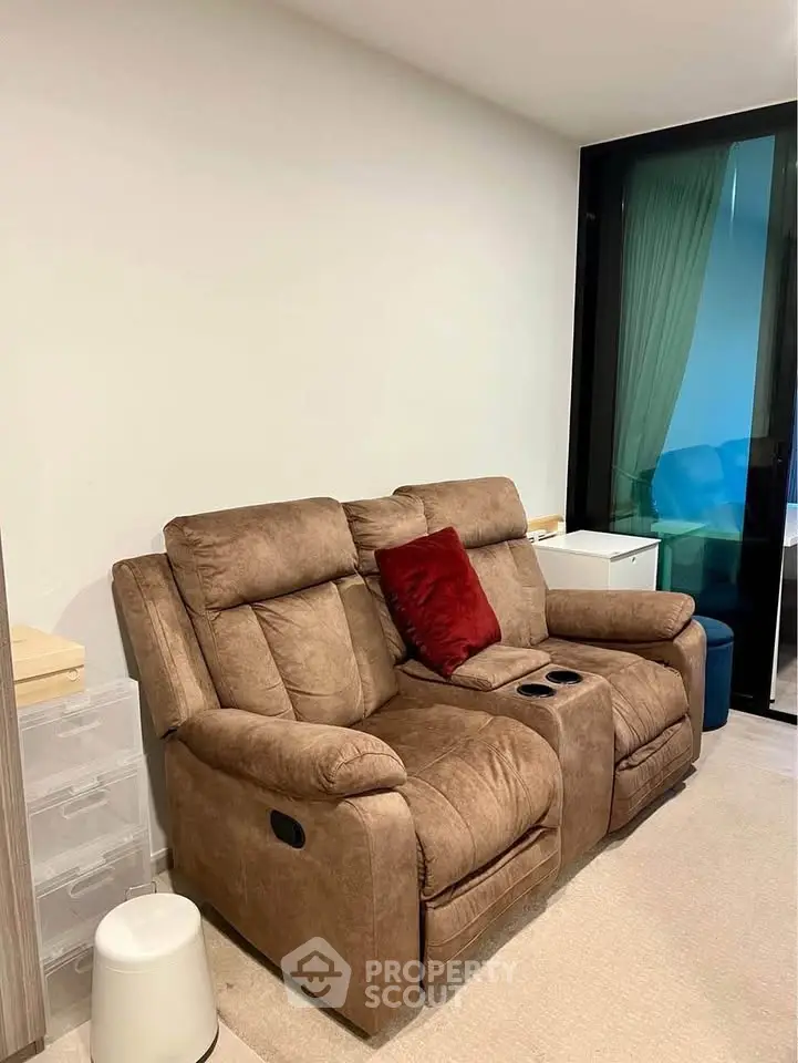 Cozy living room with plush recliner sofa and modern decor