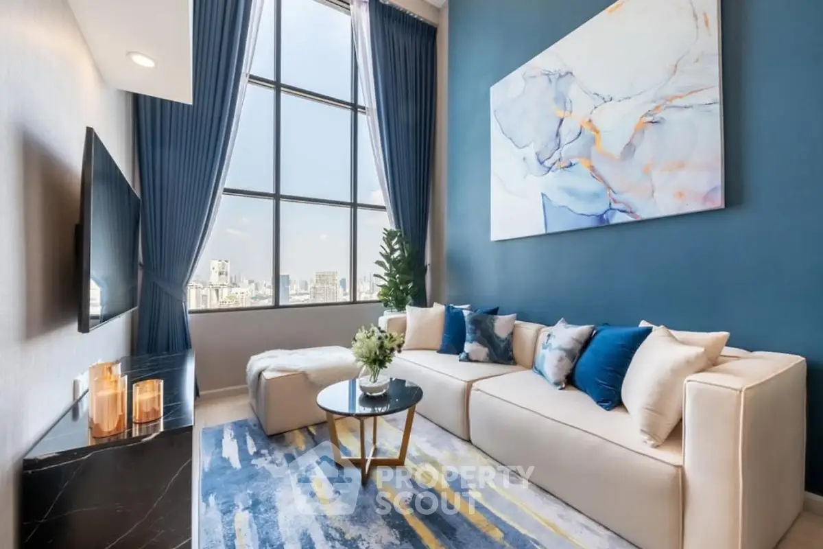 Luxurious living room with high ceilings, large windows, and elegant decor in a modern apartment.