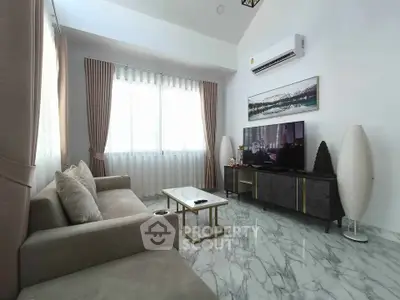 Modern living room with marble flooring and stylish decor