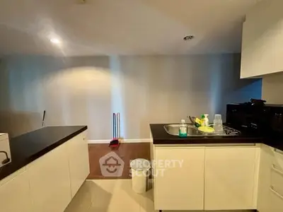 Modern kitchen with sleek countertops and minimalist design