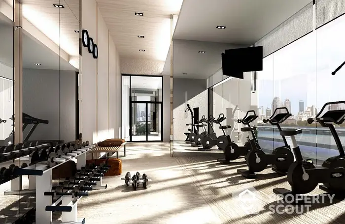 Sunlit modern gym with floor-to-ceiling windows offering panoramic city views, equipped with state-of-the-art fitness machines and free weights.