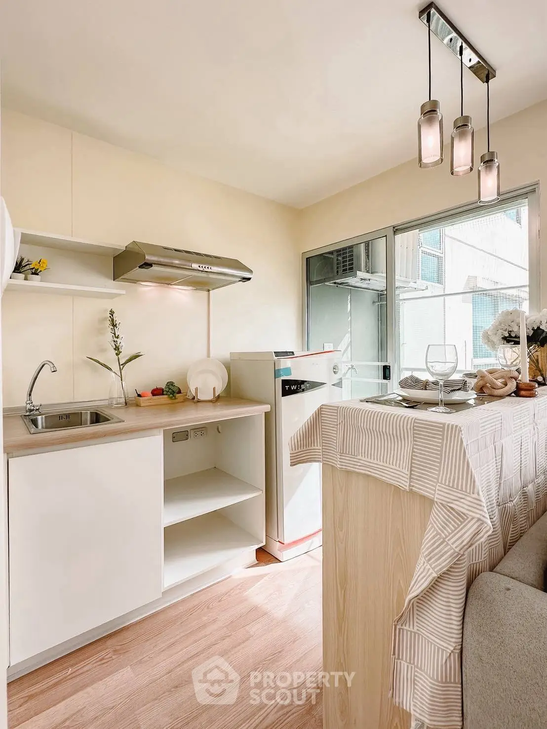Chic modern kitchen with open layout and stylish lighting